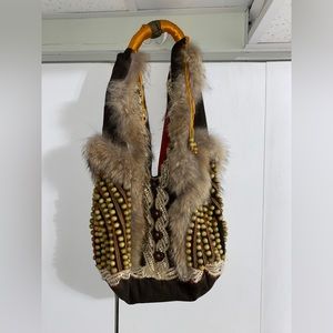 Shoulder bag with wooden beads and coyote fur